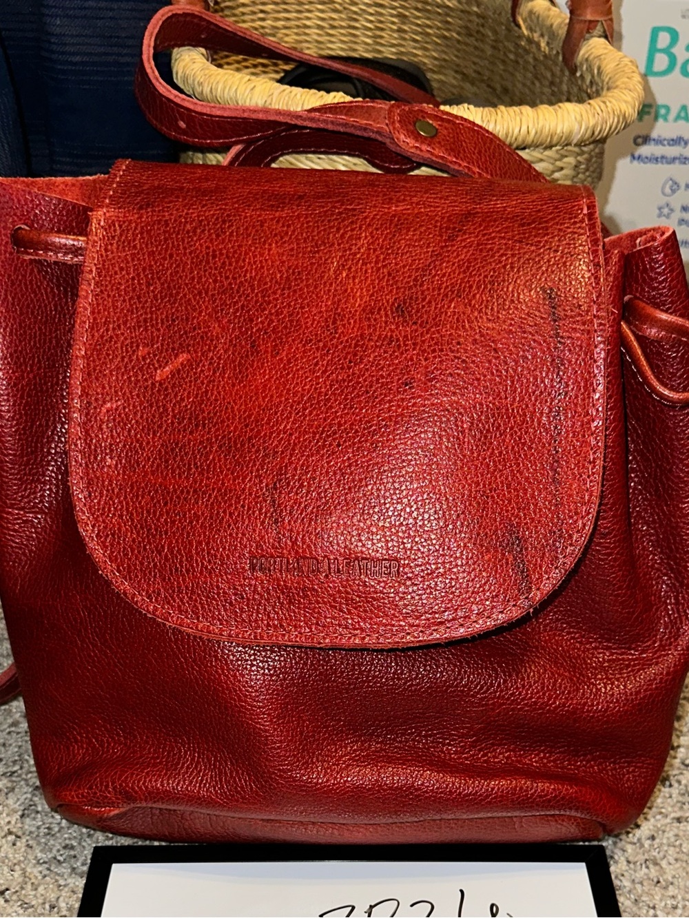 Portland leather chili red bucket backpack